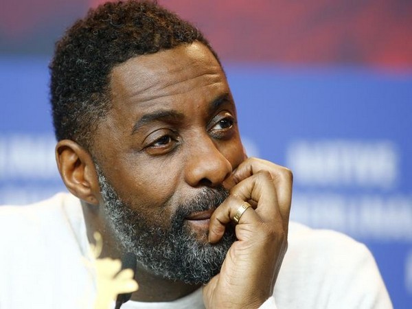 Idris Elba at a news conference 