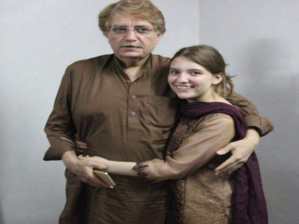 Human rights defender Idris Khattak with his daughter Talia Khattak (Photo courtesy: Amnesty International)