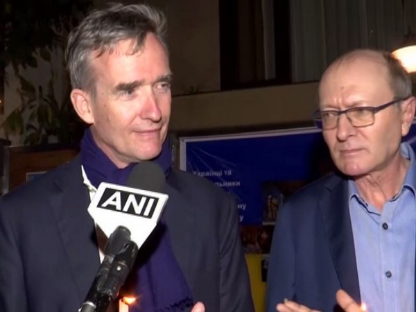 British High Commissioner to India, Alex Ellis and Ukraine Ambassador to India Igor Polikha at candlelight vigil. (ANI)