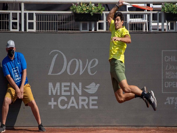 Tennis player Christian Garin in action 