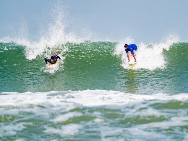Surfers practicing ahead of India Open of Surfing