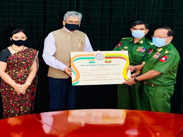 Indian Ambassador to Myanmar Saurabh Kumar on Friday gave USD 5 million cheque to Lt-Gen Ye Aung, Minister for Border Affairs. Photo/ANI