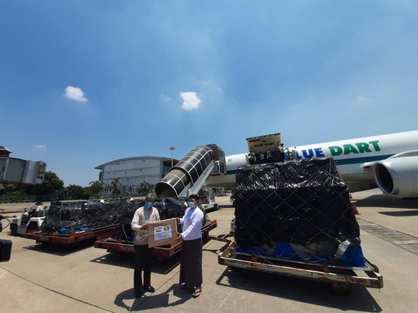    Ambassador of India to Myanmar, Saurabh Kumar handing over medical supplies to Myanmar's Ministry of Health and Sports at Yangon Airport on Wednesday.