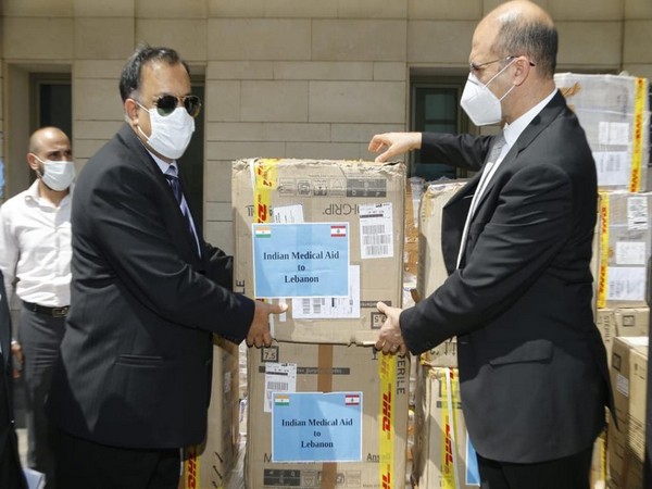 Indian Ambassador to Lebanon Suhel Ajaz Khan handing over the PPE kits to Lebanon Minister of Public Health Hamad Hassan. 