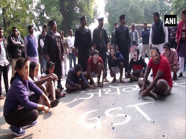 Indian Youth Congress (IYC) workers enact play to protest against Budget Session in New Delhi on Saturday.