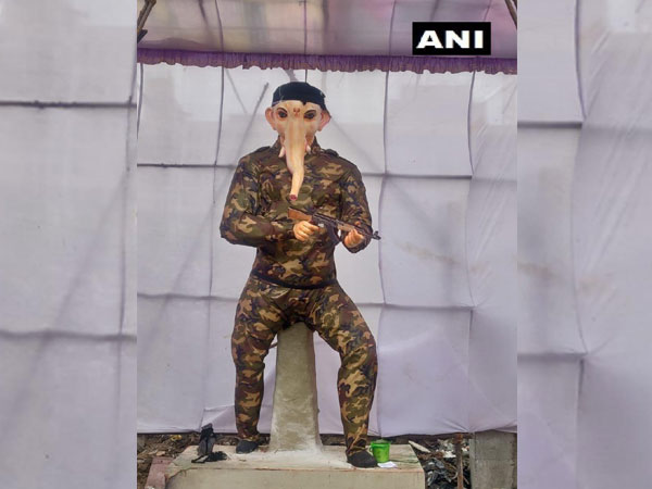 an idol of Ganesha that resembles army personnel
