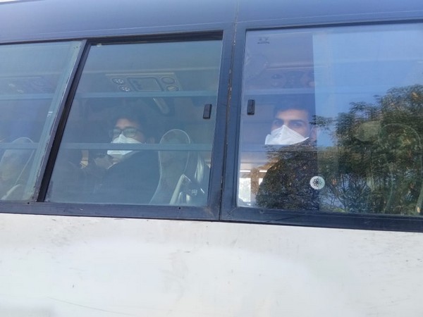 The bus carrying Indians who arrived from Wuhan on a special Air India flight on Saturday (Photo/ANI)
