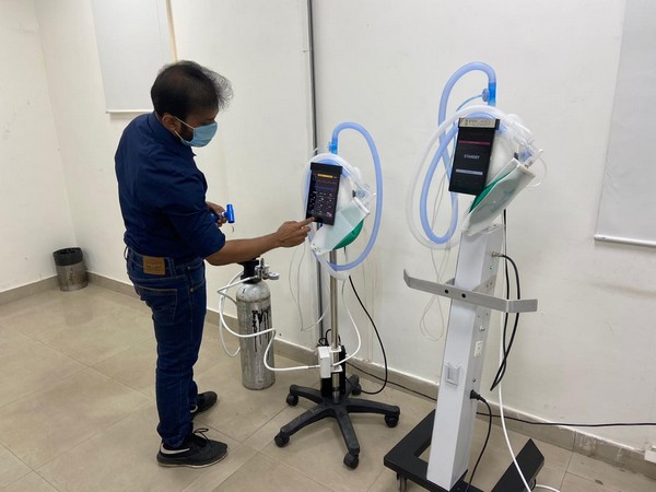 Professor Diwakar Vaish, the owner of AgVa company, giving a demonstration of the ventilator. Photo/ANI