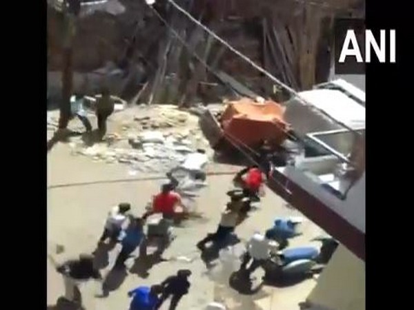 People pelted stones at health workers who had gone for screening for COVID-19 in the locality. Photo/ANI