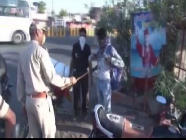 Police in Indore uses hand-held metal detector mounted over 'lathis' to check people amid COVID-19 lockdown