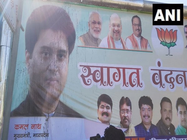 Ink thrown on BJP posters welcoming Scindia ahead of return to Bhopal. Photo/ANI