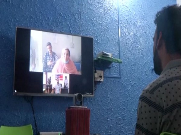 Inmates in Jammu's Amphalla Jail using 'Mulakaat' a video conference facility to talk to their relatives amid COVID-19. [Photo/ANI]