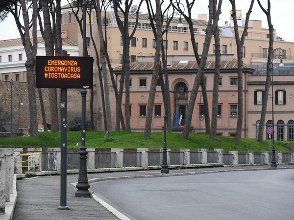 An empty street with a banner that reads 