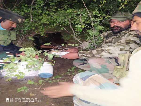 Security forces at the hideout destroyed by them in Budgam district. Photo/J-K Police