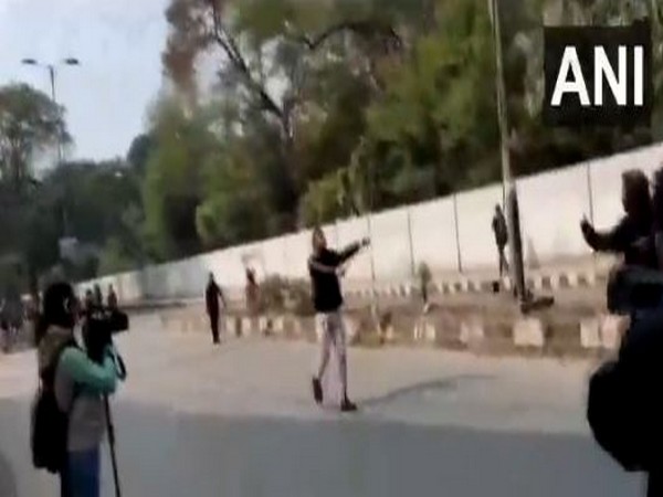 Man brandishes gun in Jamia area in New Delhi. Photo/ANI
