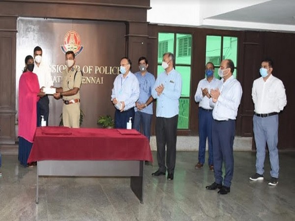 Priyadarshini, daughter of COVID Warrior, late Constable Murugan, Selayur Police station. She got the scholarship from Mr. Mahesh Aggarwal, Commissioner of Police, Greater Chennai