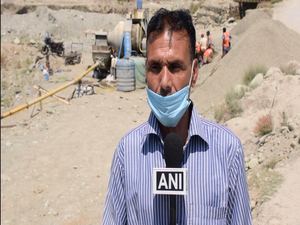 A resident of Shopian district present at the construction site speaking to ANI on Monday. (Photo/ANI)