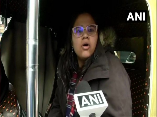 A student of Jawaharlal Nehru University (JNU) seen today leaving the campus after a violence broke out yesterday evening