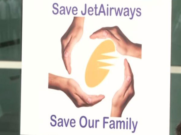 JetAirways employees gathered at the Delhi airport on Sunday to commemorate the 26th anniversary of the airline. Photo/ANI