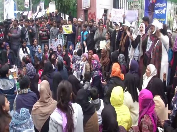 Students and locals gather for protest against CAA near Jamia University campus on Saturday. Photo/ANI
