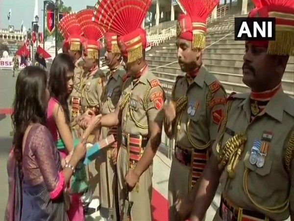 Women celebrated Raksha Bandhan with BSF Personnel at Attari-Wagah Border on Thursday (Photo/ANI)
