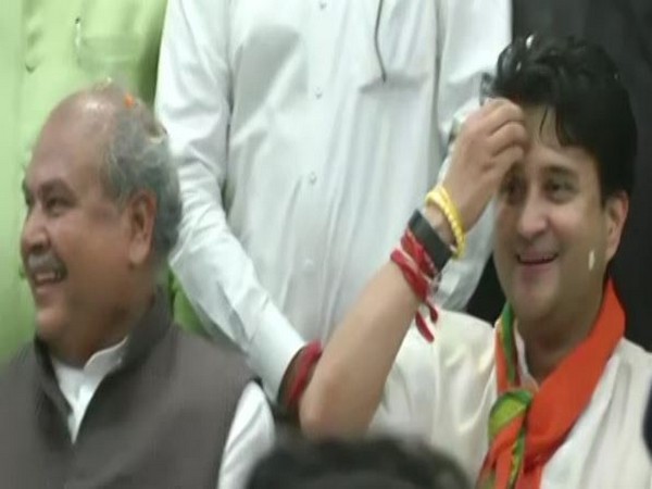 Jyotiraditya Scindia with Union Agriculture Minister Narendra Singh Tomar at the BJP party office in Bhopal. Photo/ANI