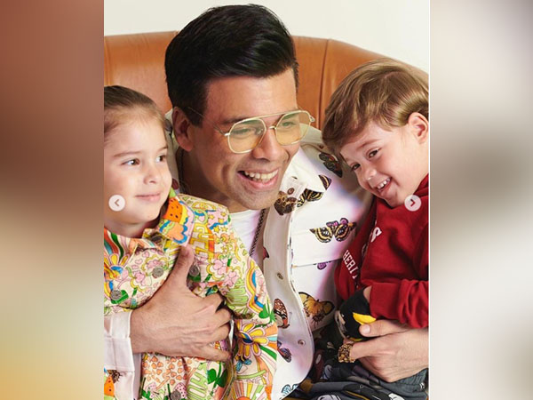 Filmmaker Karan Johar with the twins, Yash and Roohi (Image courtesy: Instagram)