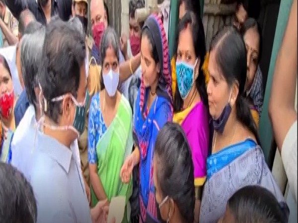    Telangana Minister KTR Rao during his visit to flood-affected areas at Lalapet, Secunderabad on Wednesday.
