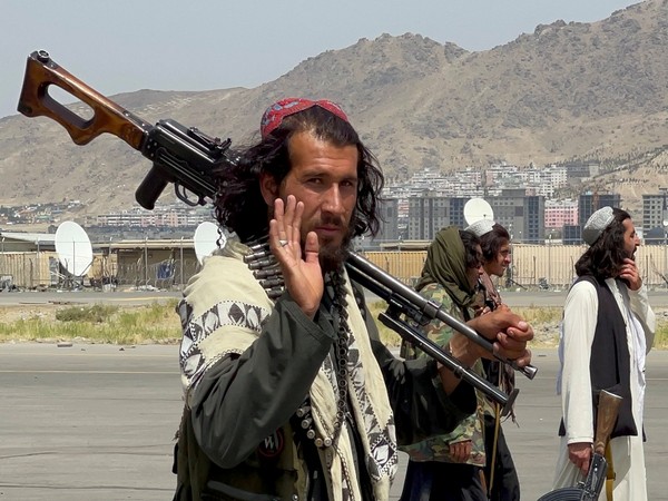 Taliban at the tarmac of Kabul airport. (Photo Credit - Reuters)