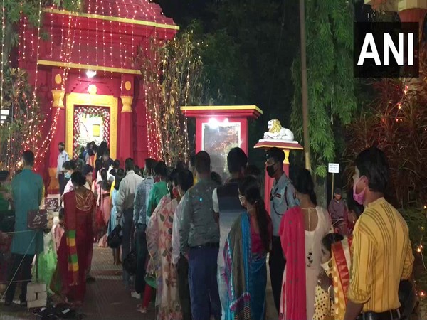 Devotees throng a Kali Puja pandal in Agartala on Saturday night. (Photo/ANI)