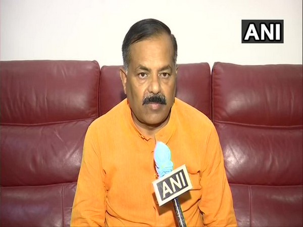 Manoj Shukla, Brother of former minister of State Santosh Shukla on Vikas Dubey's encounter on Friday speaks to ANI. (Photo/ANI)