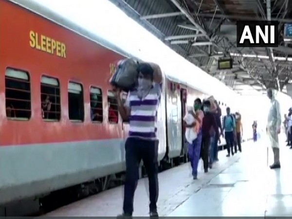 Migrant labourers reach Kanpur from Sabarmati in Gujarat.