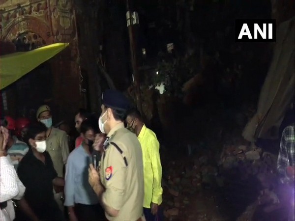 Rescue operation is underway at the building collapse site in Kanpur.