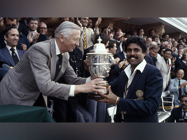 Kapil Dev holding the World Cup Trophy. (Photo- ICC Cricket)