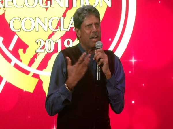 Former cricketer Kapil Dev speaking at an event in New Delhi on Sunday. Photo/ANI