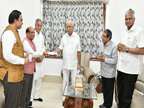 Members of the Jain Temple trusts handing over the sum of Rs 51 Lakh to Karnataka CM Relief Fund on Monday.