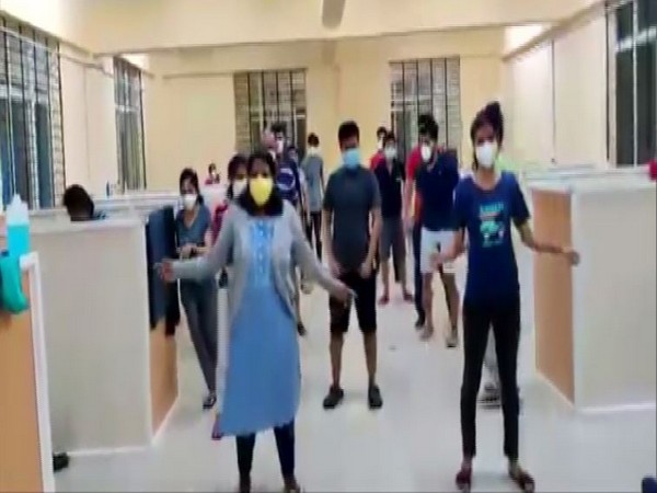 Asymptomatic COVID-19 patients take part in a flash mob at Ballari COVID-19 care centre, Karnataka. (Photo/ANI)
