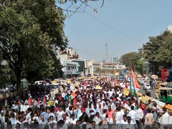 Karnataka Congress on Saturday took out a protest march near the CM's office in Bengaluru. Photo/ANI