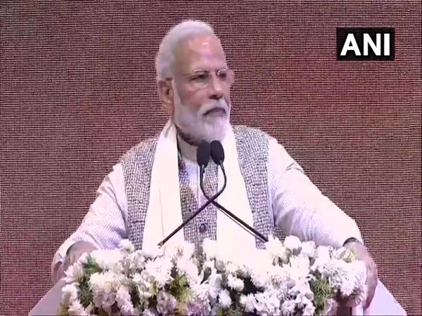 Prime Minister Narendra Modi speaking at the programme in Varanasi on Sunday.