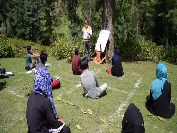 government teachers of High school Kandajan are conducting open-air community classes in Yusmarg area of Budgam district.