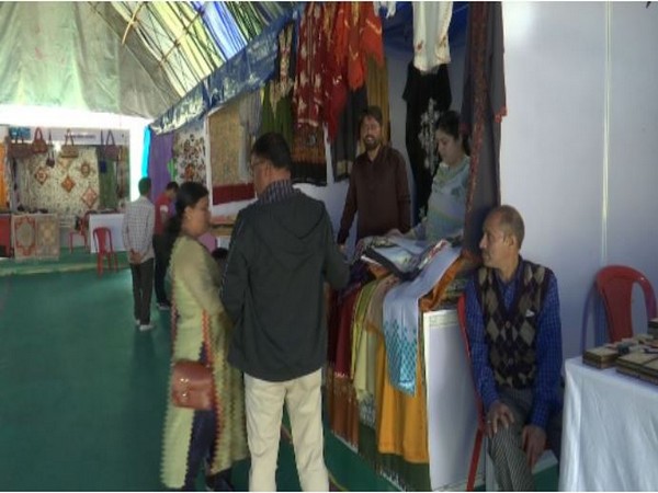 Visuals from the exhibition at Dal Lake (Photo/ANI)