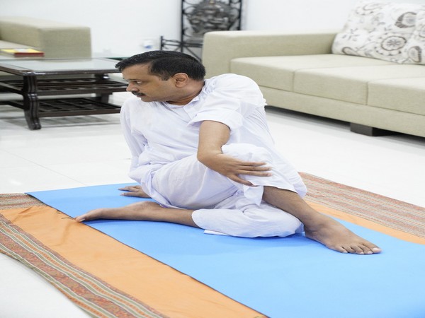 Delhi CM Arvind Kejriwal performing Yoga on International Yoga Day on Sunday. [Photo/ANI]
