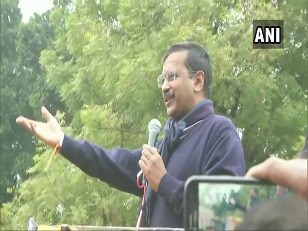 Delhi Chief Minister Arvind Kejriwal speaking at a roadshow in New Delhi on Monday. Photo/ANI