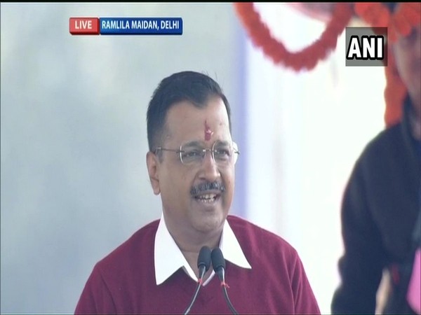 Delhi Chief Minister Arvind Kejriwal addressing a gathering at Ramlila Maidan on Sunday. Photo/ANI