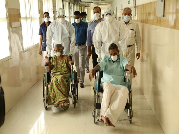 The elderly couple discharged after they recovered from COVID-19 in Kottayam, Kerala on Friday. Photo/ANI