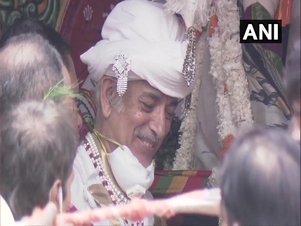 Former King of Puri Gajapati Maharaja Dibyasingha Deb on the chariot performing 'Chhera Pahanra' ritual in Puri, Odisha here on Tuesday. (Photo/ANI)