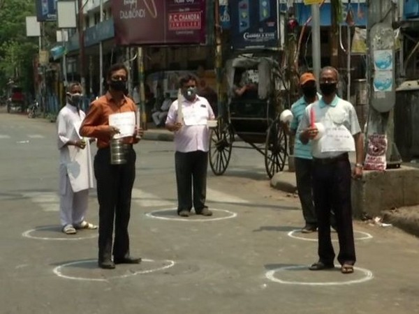 Congress workers in Kolkata holding a silent protest against Prime Minister Narendra Modi's call to light candles. Photo/ANI