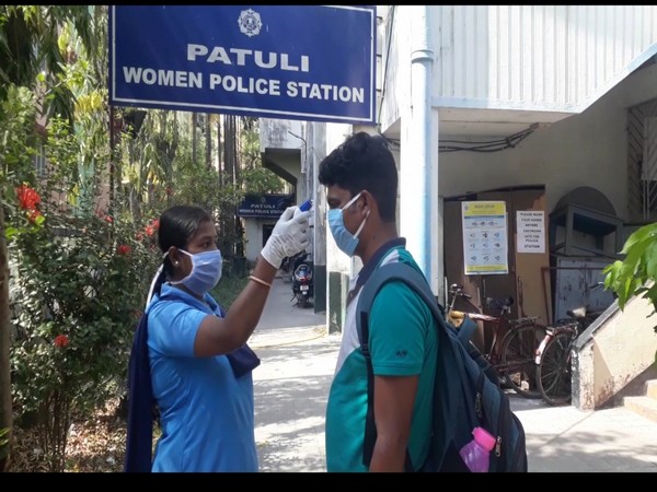 A visitor is being screened at Patuli Police Station in Kolkata on Friday. Photo/ANI