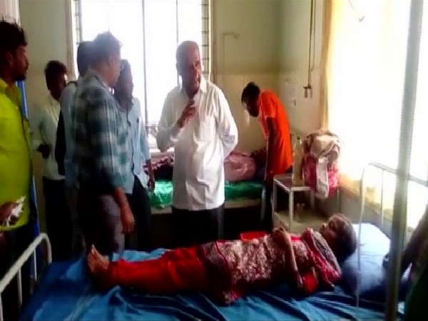 BJP MLA Halappa Achar visiting a hospital to meet victims of a bee attack at a government college in Karnataka.