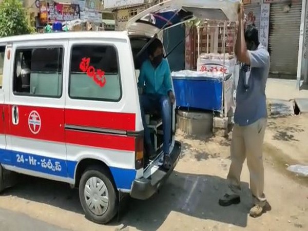 Police putting lockdown violators into ambulance in Andhra Pradesh. Photo/ANI